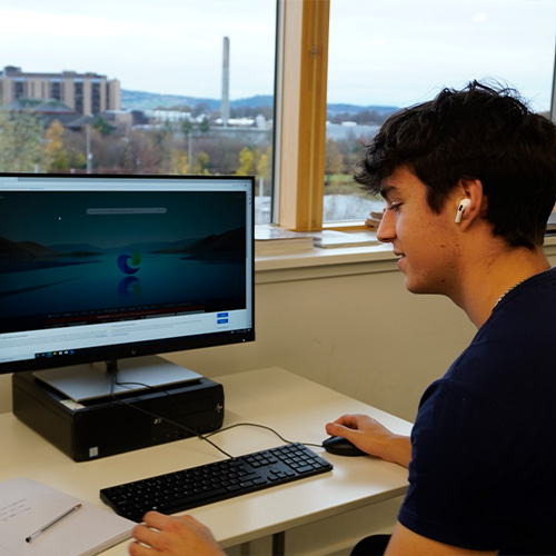 student on computer student on computer