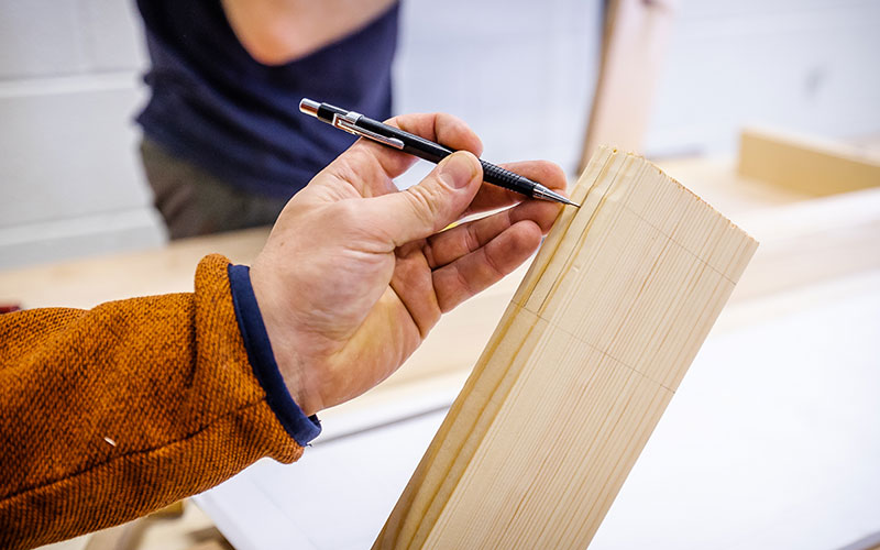 a hand marking wood for cutting a hand marking wood for cutting