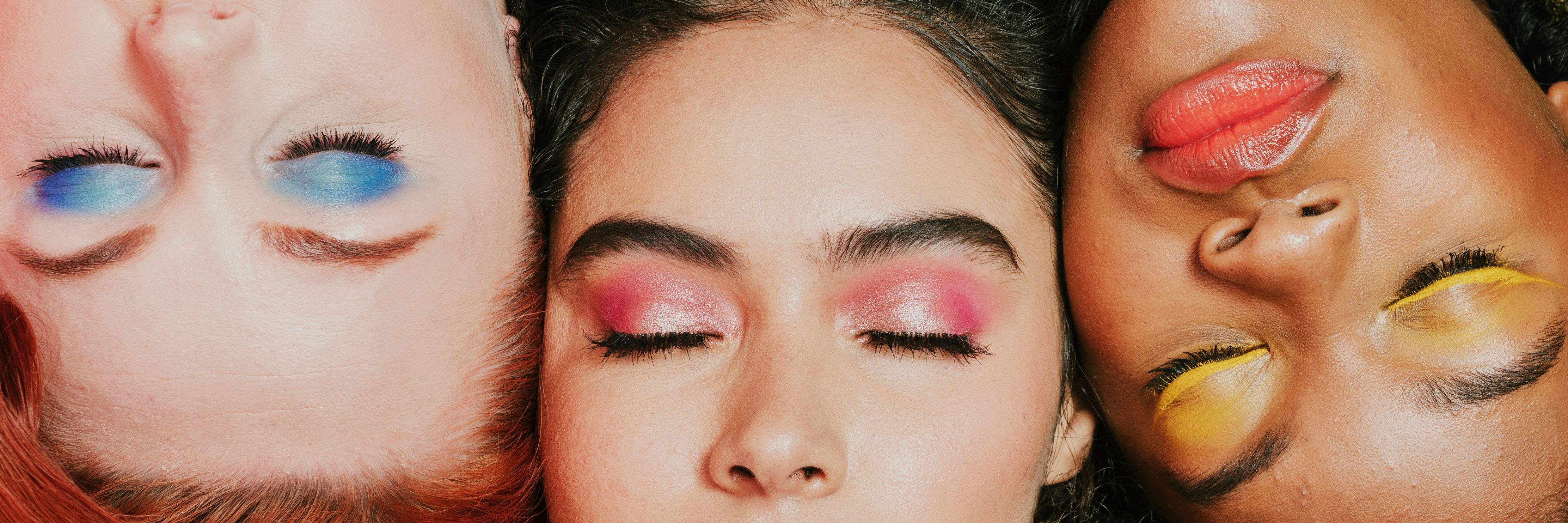 students with striking eye shadow students with striking eye shadow